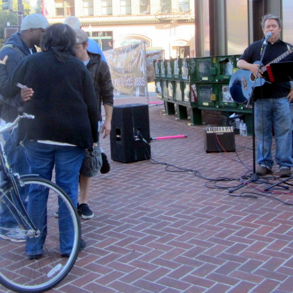 NOREEN & EDDIE PRAY FOR MAN WHILE PAUL COCA SINGS IN BERKELEY